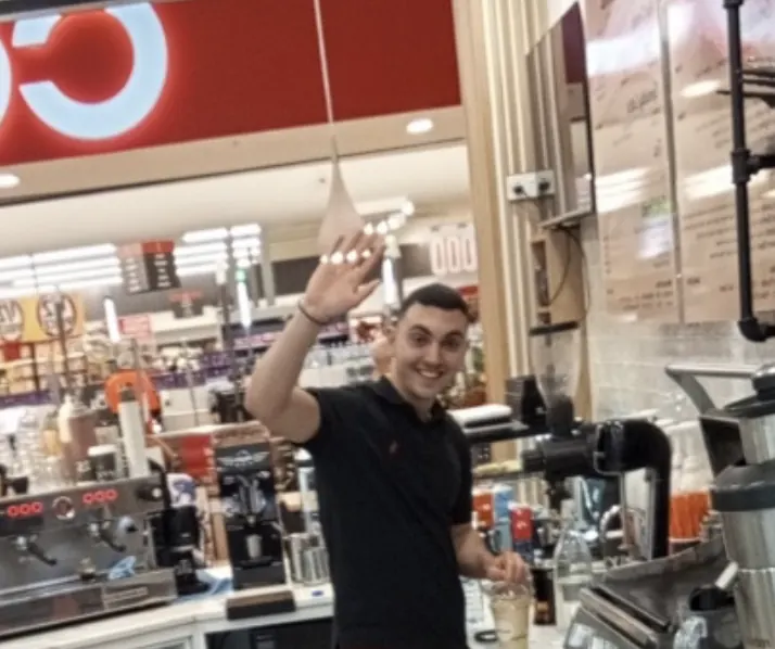 Working behind the counter in a cafe in Australia